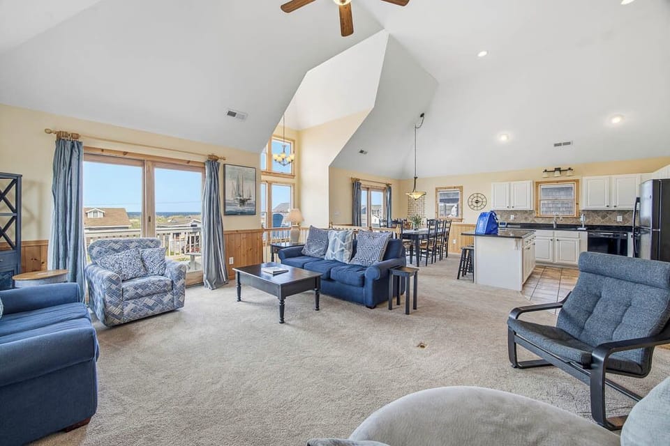 Top-Level Living Room with Deck Access