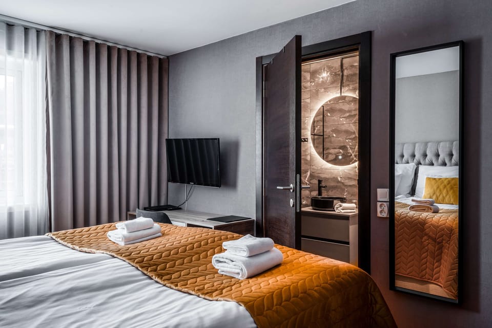 Desk, blackout drapes, cribs (free), WiFi (free)