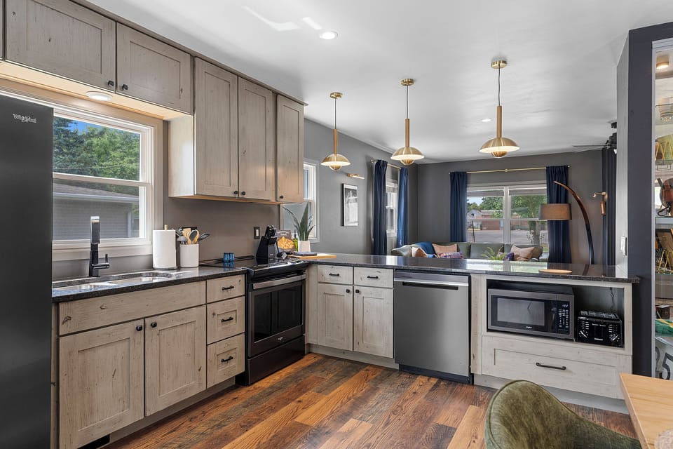 Fully equipped kitchen with full-size appliances and plenty of space for group stays.