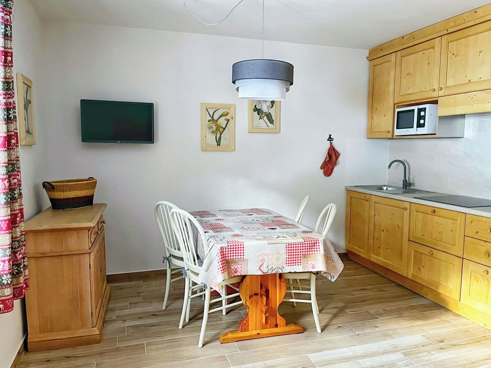 Furniture, Interior Design, Flooring, Wood, Floor, Room, Ceiling, Table, Cabinetry, Chair
