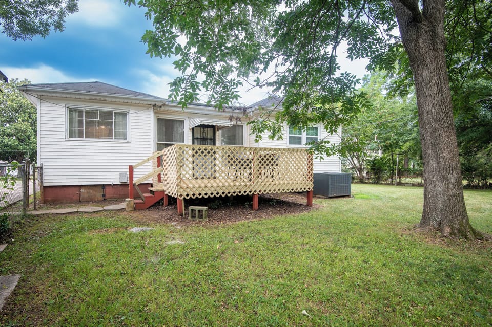 Step outside and enjoy a spacious backyard with plenty of room to relax and unwind. The private deck offers a comfortable spot to sip your morning coffee, enjoy some fresh air, or wind down after a day of exploring. This outdoor space adds a peaceful touch