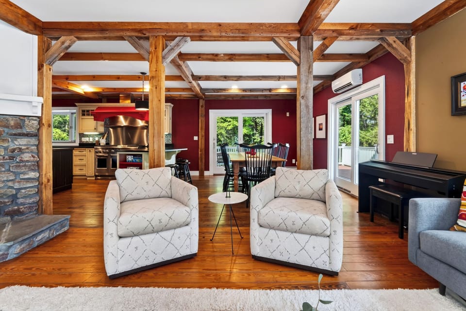 Post-and-beam sightlines from the living room through to the kitchen