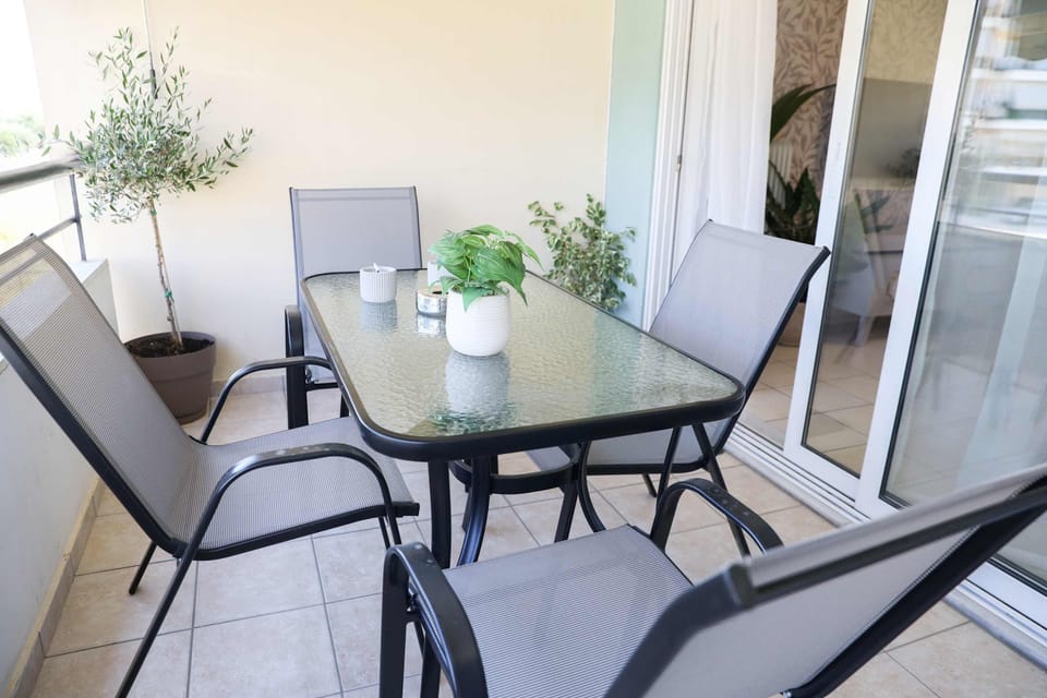 A quaint balcony for a mornming coffee or a night drink