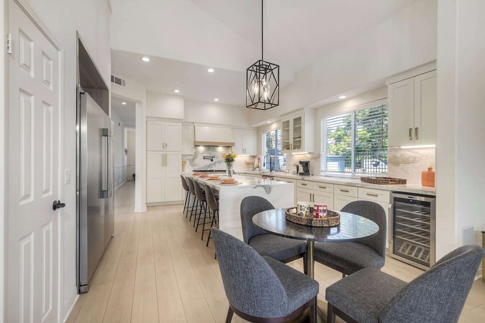 Enjoy a cozy meal or morning coffee at this inviting dining table