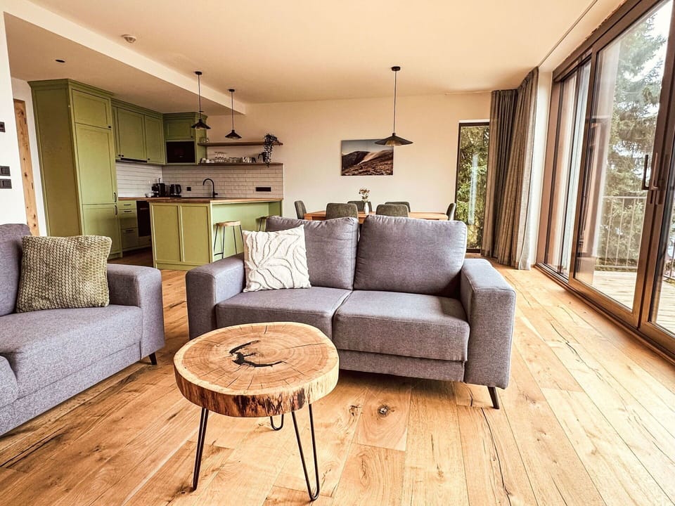 Furniture, Flooring, Interior Design, Couch, Floor, Wood, Living Room, Wood Flooring, Room, Lighting