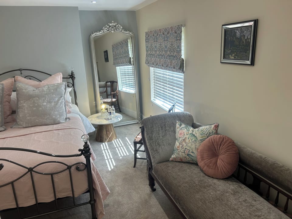 Deluxe Double Room | Desk, laptop workspace, blackout drapes, iron/ironing board