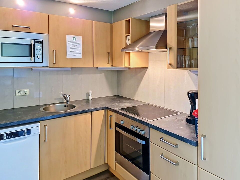 Kitchen Appliance, Kitchen, Countertop, Major Appliance, Cabinetry, Kitchen Sink, Flooring, Interior Design, Sink, Stove