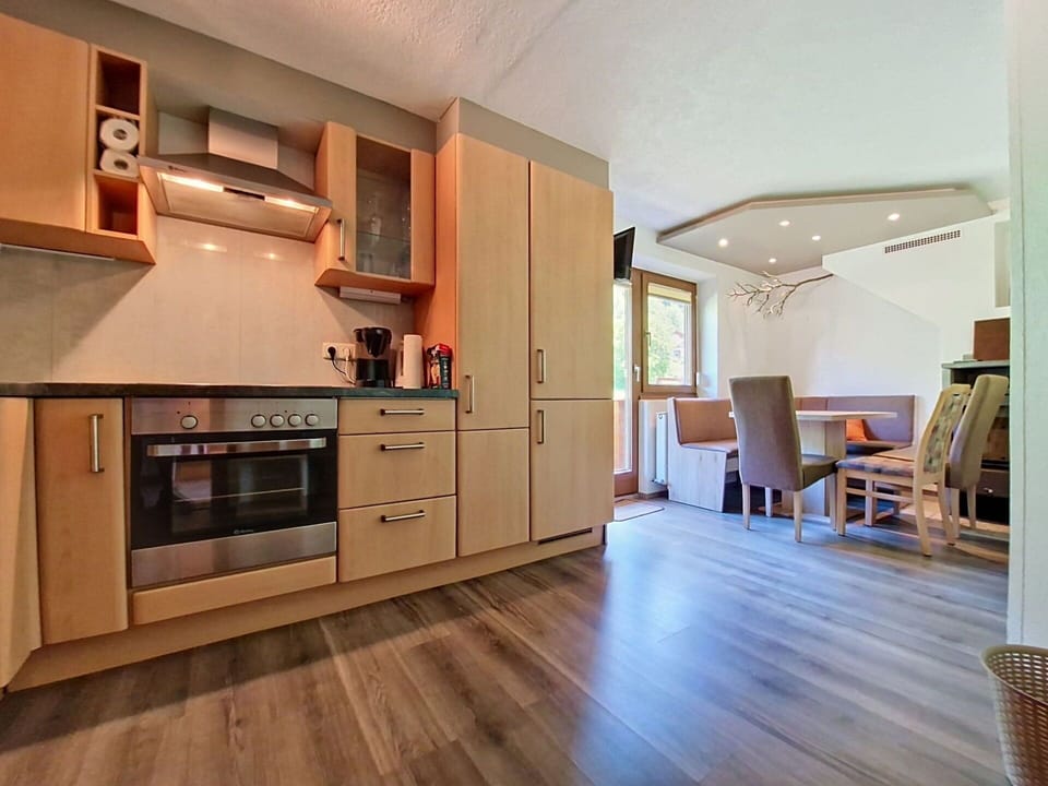 Furniture, Interior Design, Flooring, Wood, Kitchen, Floor, Cabinetry, Ceiling, Countertop, Kitchen Appliance