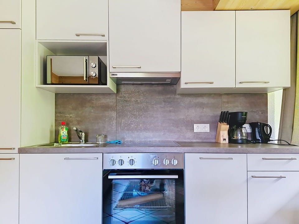 Kitchen Appliance, Kitchen, Countertop, Cabinetry, Major Appliance, Home Appliance, Flooring, Furniture, Interior Design, Wood