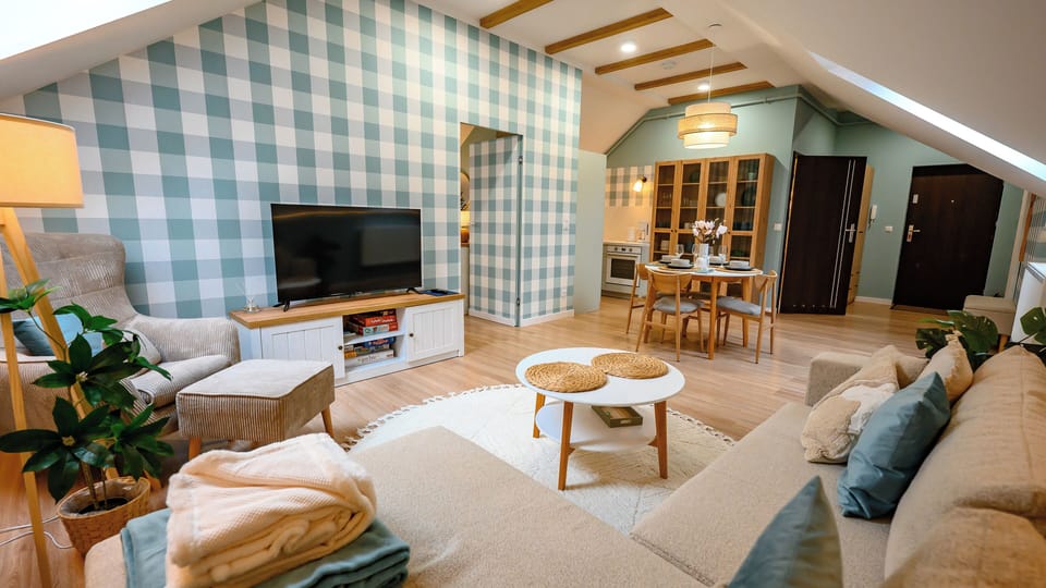 Apartment | Living area | 30-inch flat-screen TV with digital channels