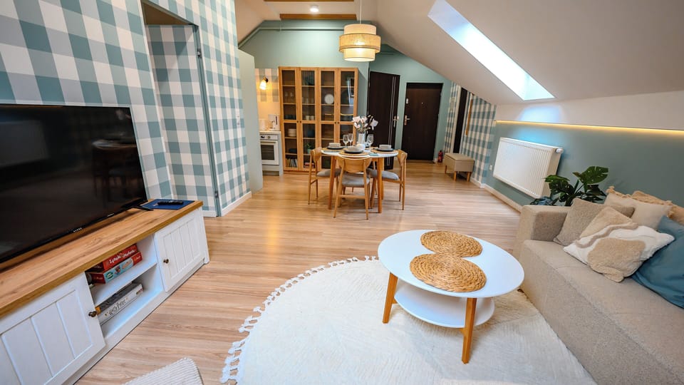 Apartment | Living area | 30-inch flat-screen TV with digital channels