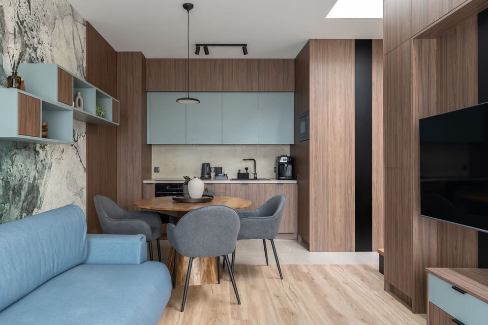 Deluxe Apartment, Beachside | Private kitchenette | Espresso maker, electric kettle, highchair, dining table