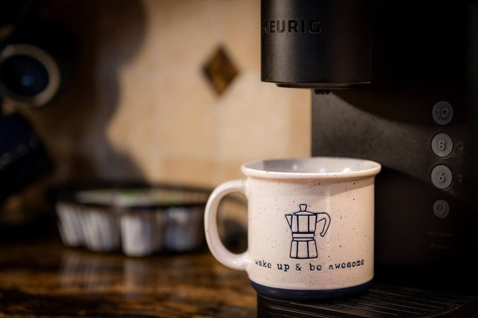 Wake up to mountain views and your favorite brew with the Keurig, ready for coffee lovers who like quick cups or all-day refills.