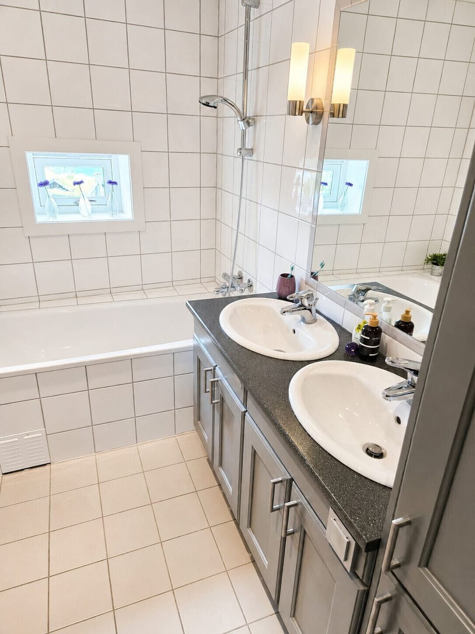 Compact yet comfortable bathroom with a shower