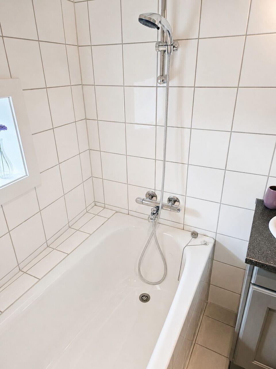 Compact yet comfortable bathroom with a shower
