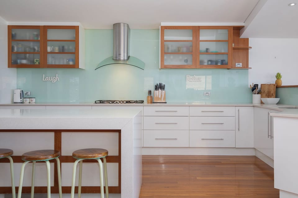 Prepare everything from beach picnics to family feasts in the fully equipped kitchen featuring quality appliances, ample storage and generous bench space.