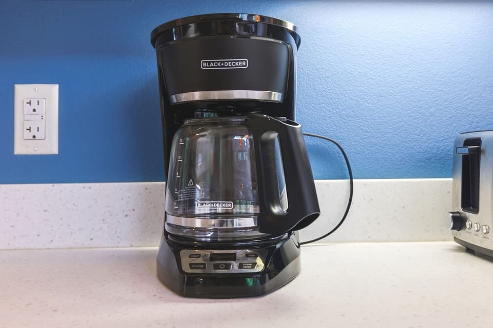 Drip coffee maker stocked and ready for your stay.