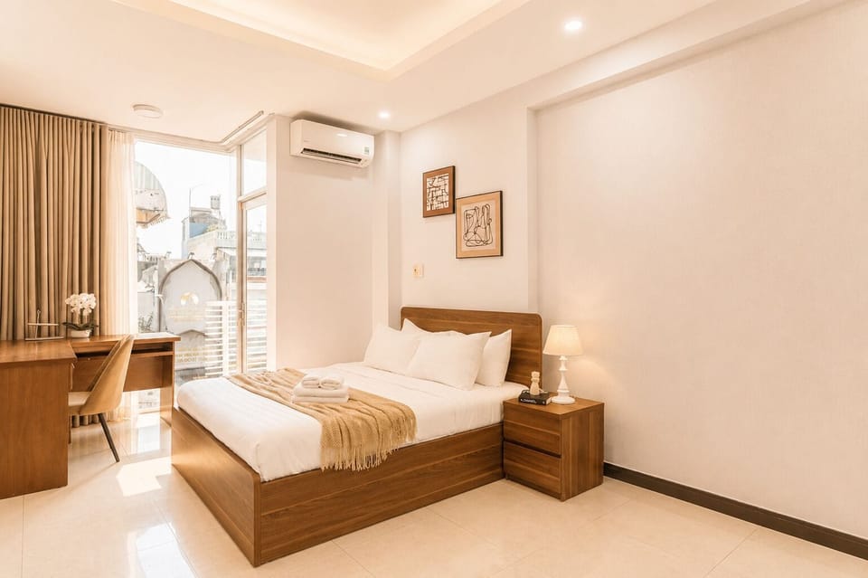 Junior Apartment, City View | Desk, laptop workspace, blackout drapes, soundproofing
