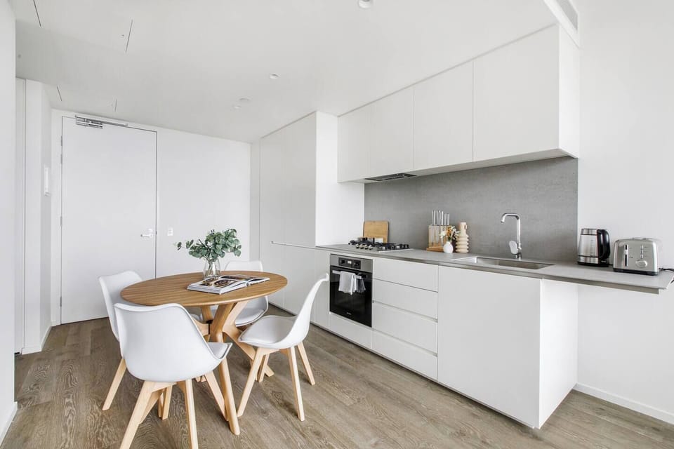  The modern, streamlined kitchen has everything you need to prepare meals at home. 
