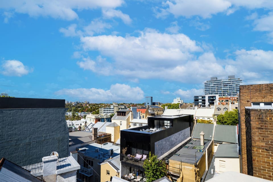 The building's shared rooftop offers a peaceful place to relax and take in the surroundings.