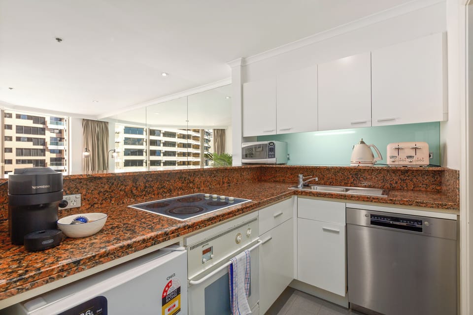 Prepare everything from a quick espresso to a home-cooked dinner in the fully equipped kitchen with a Nespresso machine, oven, cooktop, dishwasher and essentials.