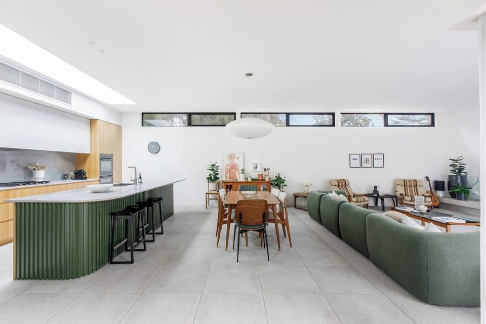 Designed for easy connection, the open-plan space lets cooking, dining, and relaxing happen all at once.
