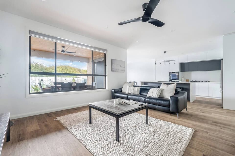 Gather effortlessly between the living area and kitchen, with open-plan spaces designed for shared meals, conversation, and slow holiday mornings together.
