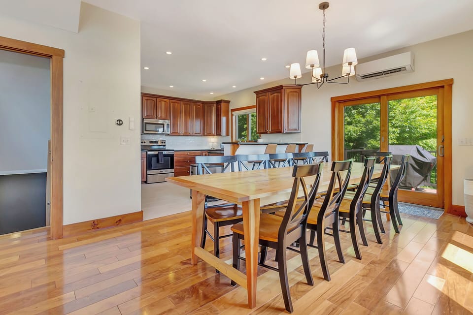 The dining area and kitchen seat 14 