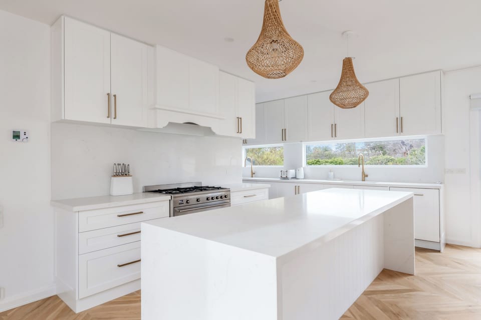 Prepare everything from beach picnics to family feasts in the kitchen, where the oversized island, premium appliances and generous bench space make cooking a pleasure.