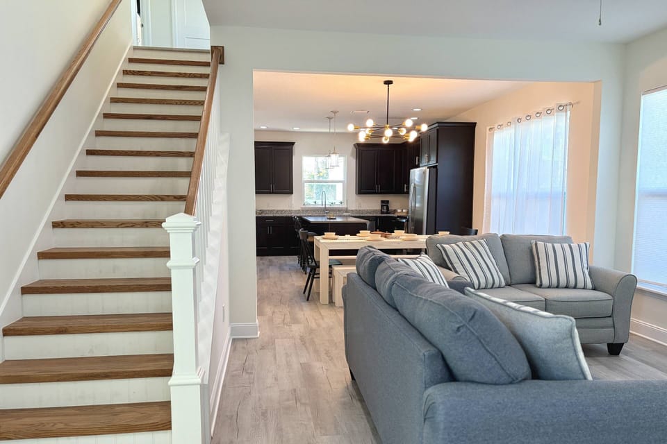 The open floorplan and comfortable new furnishings make enjoying time together a breeze.