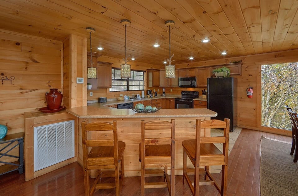 Cabin with bar seating and full Kitchen