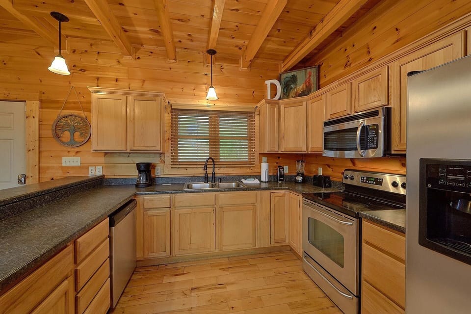 Fully furnished kitchen in 4 bedroom cabin