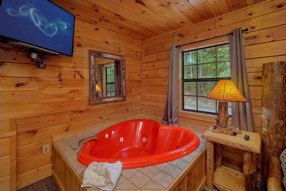 Cabin king bedroom with private jacuzzi tub
