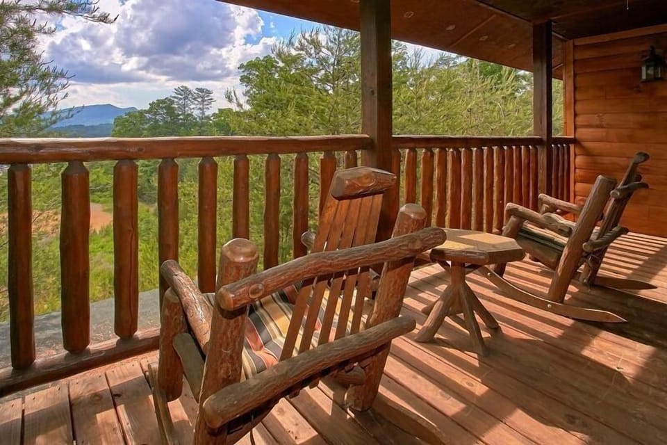 Cabin with Covered Porch and Rocking Chairs