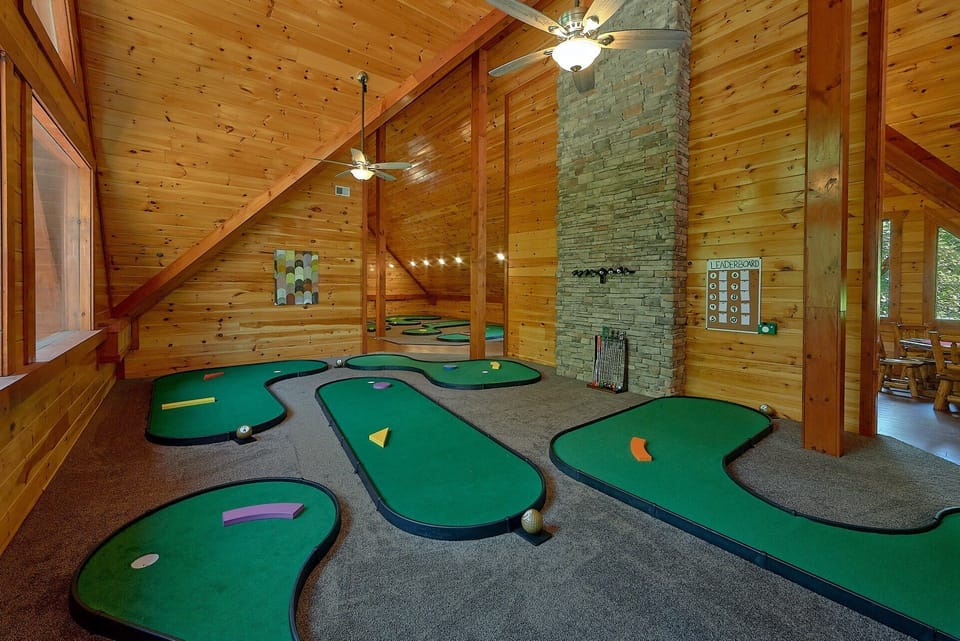 Luxury cabin rental with indoor putt putt course