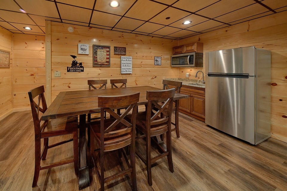 Luxury cabin with full size fridge in game room