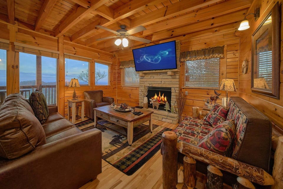 Living room with fireplace in 2 bedroom cabin