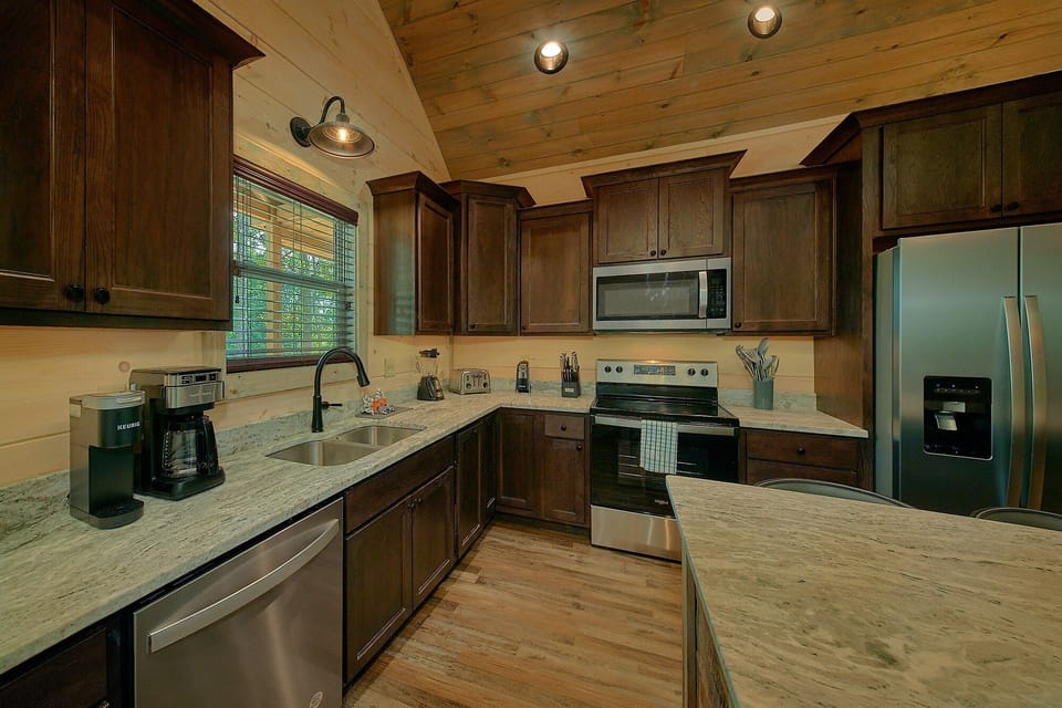Fully furnished kitchen in 4 bedroom cabin