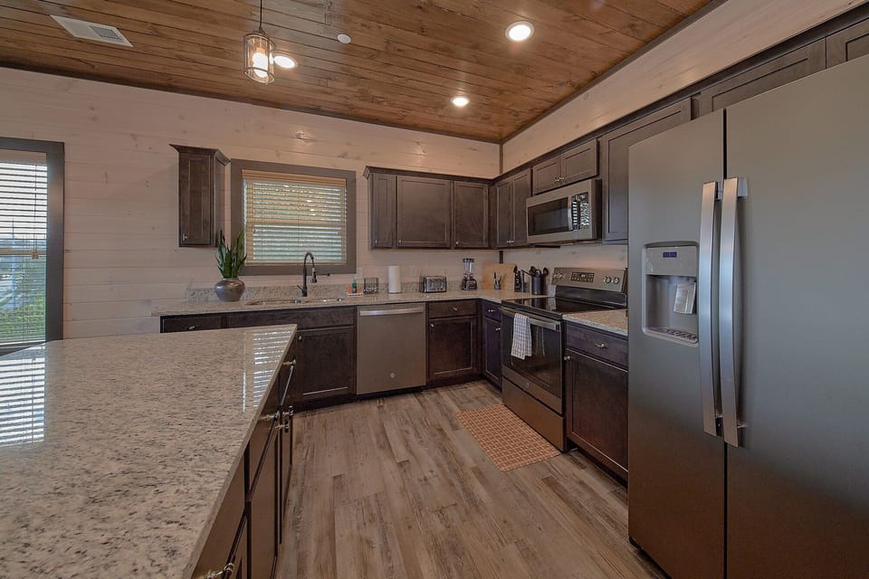 Furnished kitchen in 3 bedroom Sevierville cabin