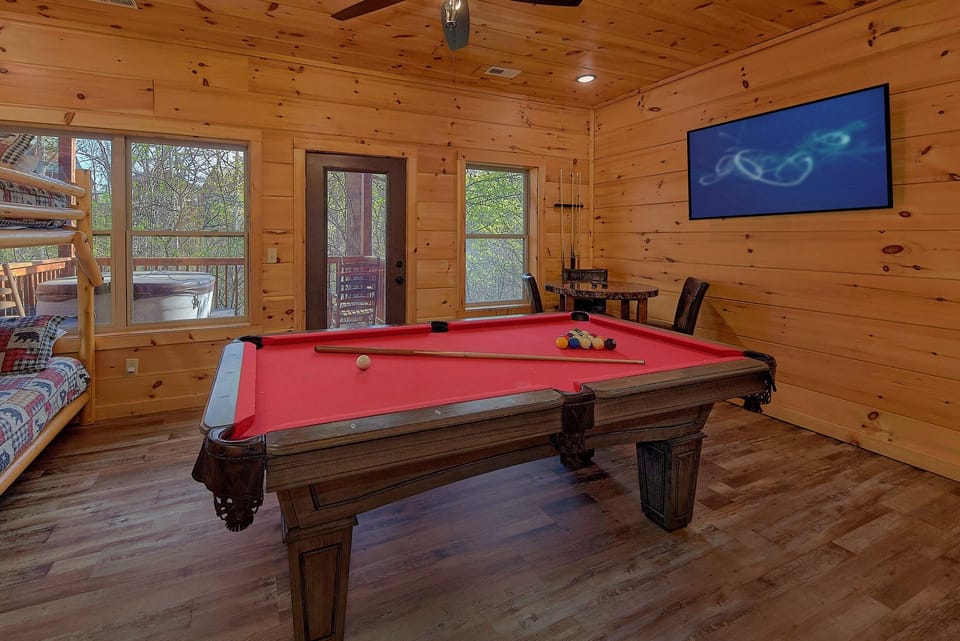Game Room with Pool Table and Cable TV