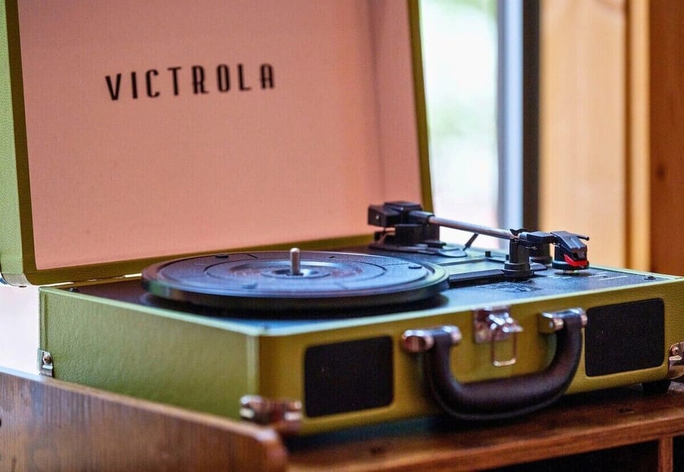 Vintage Victrola record player adds a cozy, nostalgic touch