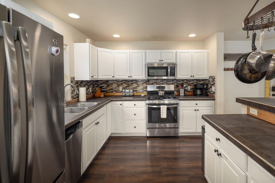 Modern Kitchen with white cabinetry | Main Level