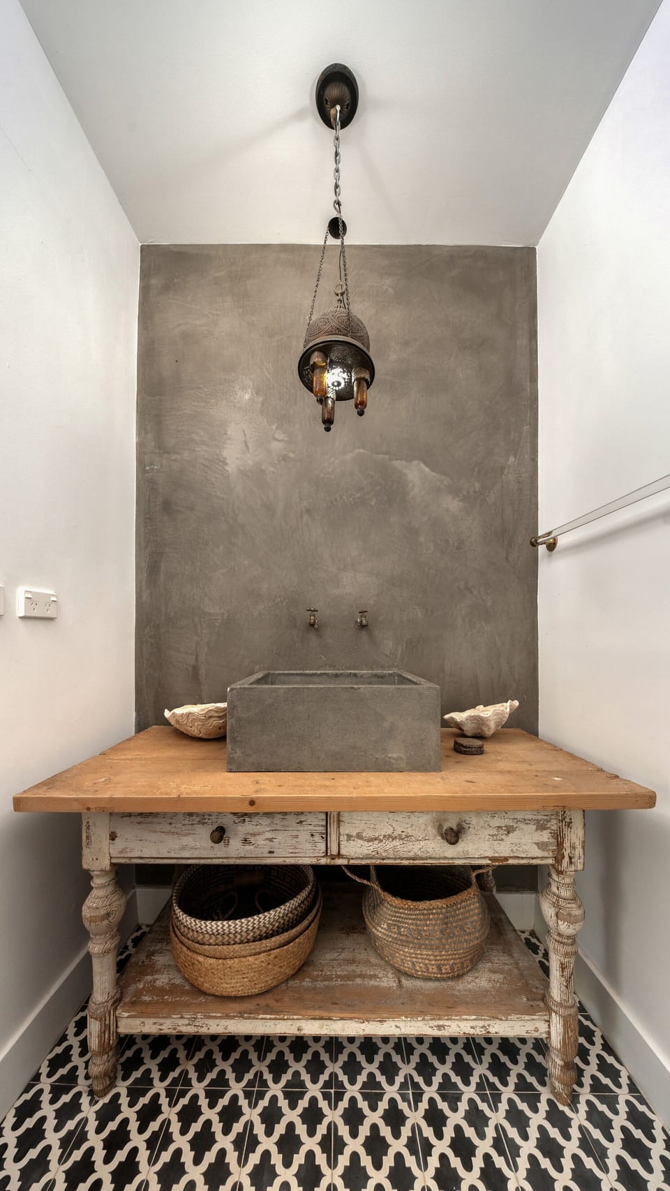 Rustic-modern vanity with concrete sink and designer details