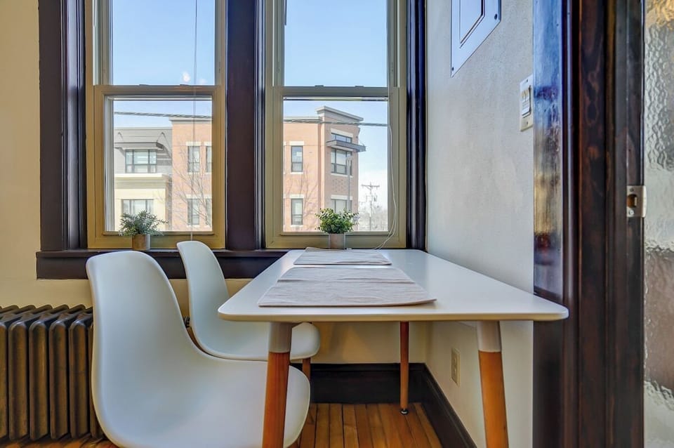 Workspace with two chairs looking out onto Willy St