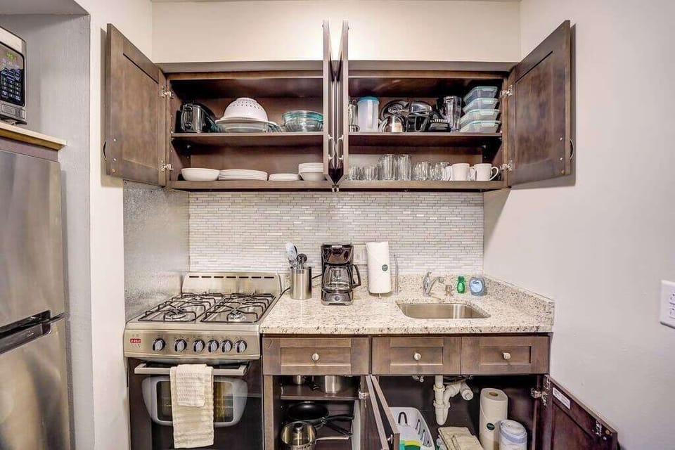 Kitchen is stocked with all the cooking and dining basics you will need to cook a meal on your first day.