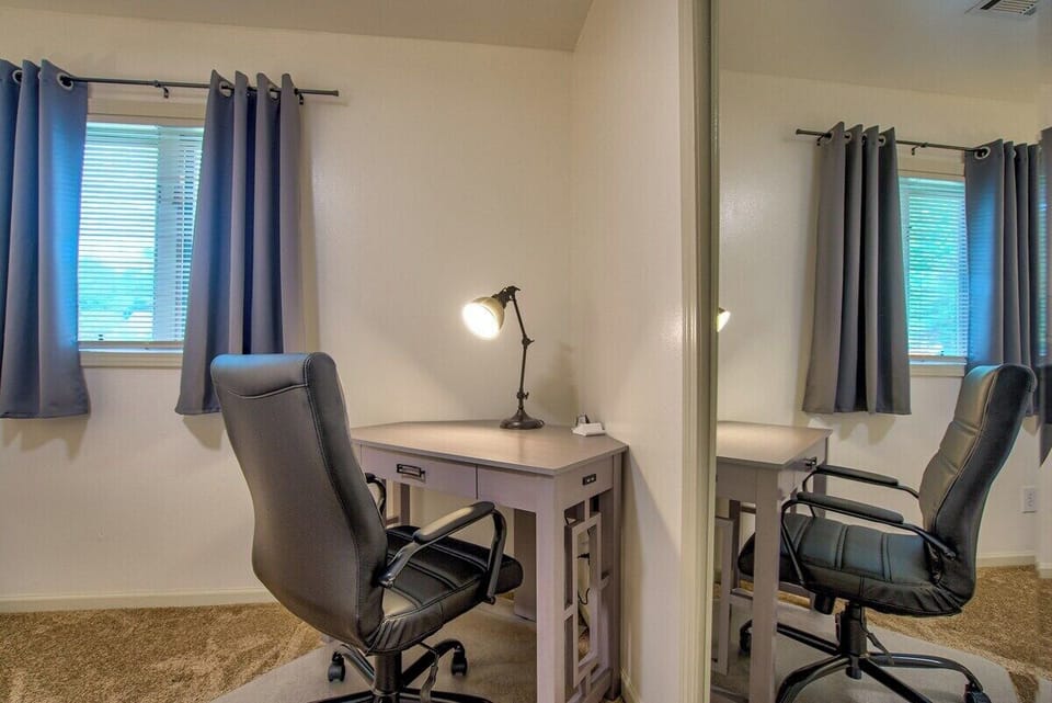 Get things done in our thoughtfully designed dedicated workspace, featuring a comfortable desk and chair to enhance your productivity.