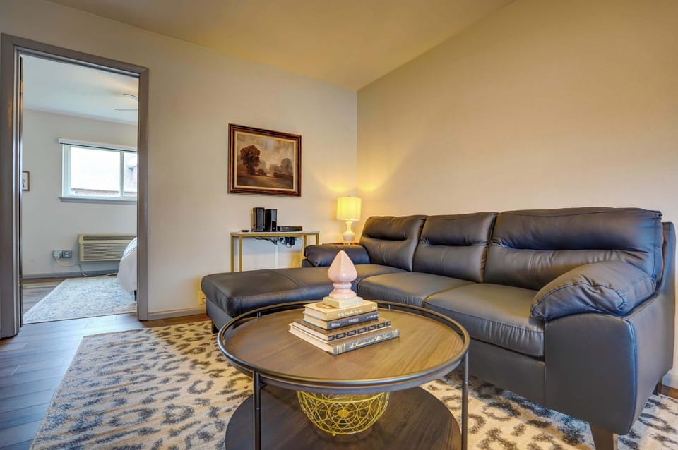 Comfortable living area featuring a plush sectional sofa, soft lighting, and thoughtful touches—perfect for relaxing after a long shift or enjoying a quiet evening at home.