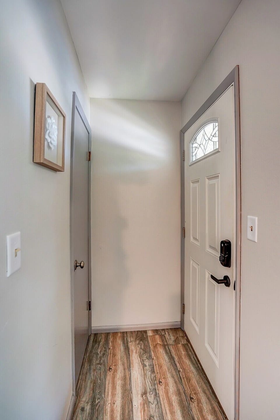Apartment entrance.  Extra storage in the closet.