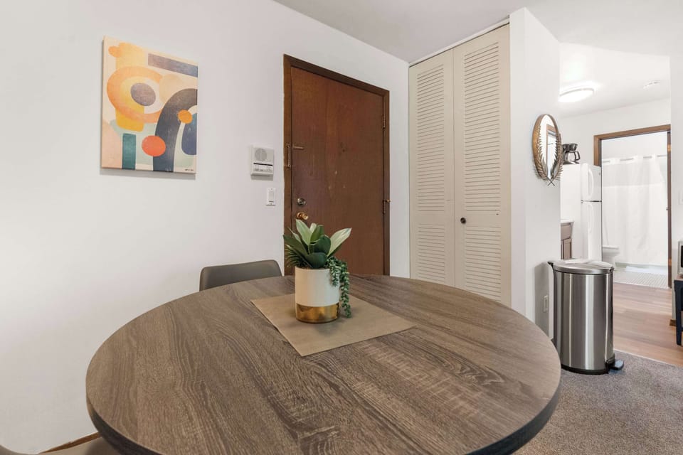 Convenient front closet provides extra storage space for coats, shoes, and essentials—perfect for keeping the entryway organized and clutter-free.