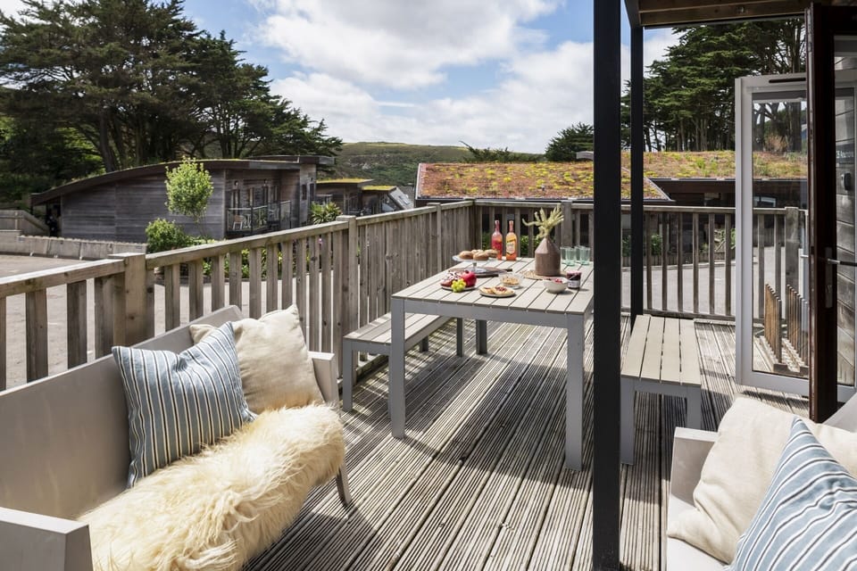 South facing decking with outdoor dining at Anemone Porthtowan